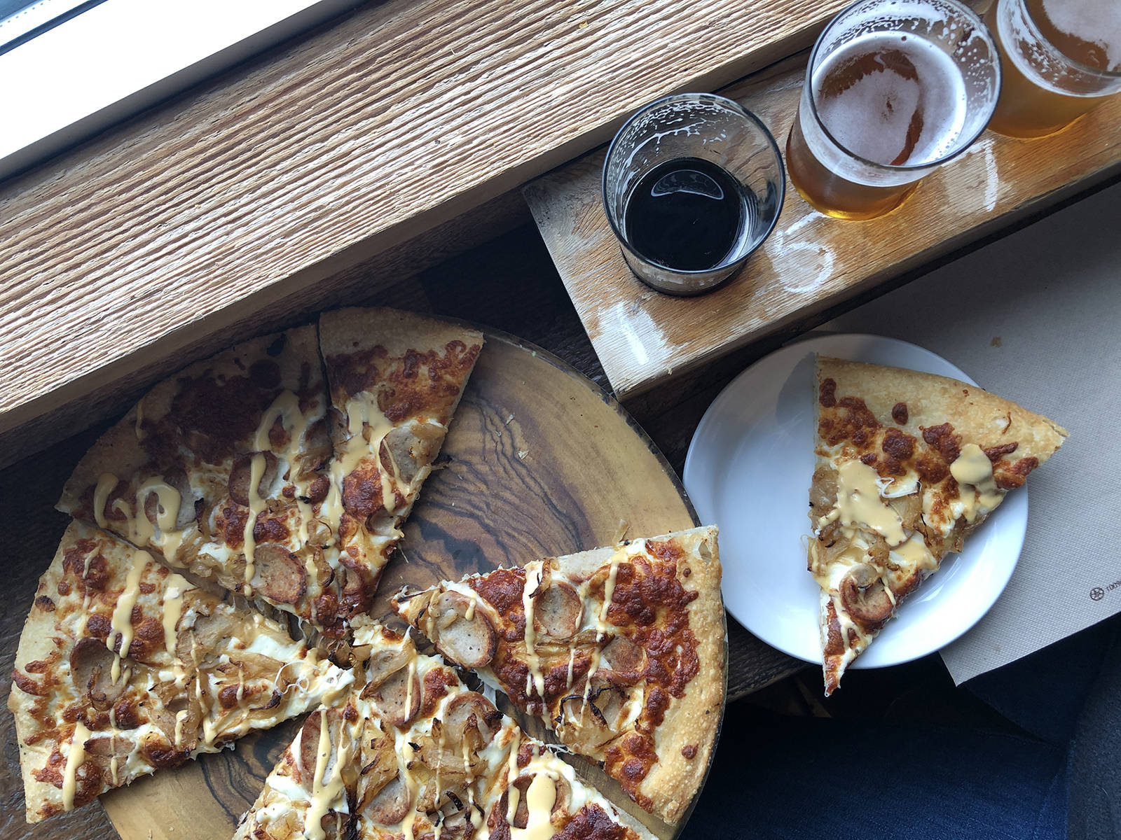 Complementing its beer line-up, Twin City Brewing also boasts an impressive kitchen, with a menu that includes hand-stretched pizzas and smoked meat sandwiches, featuring meats smoked on-site. Photo courtesy BC Ale Trail.
