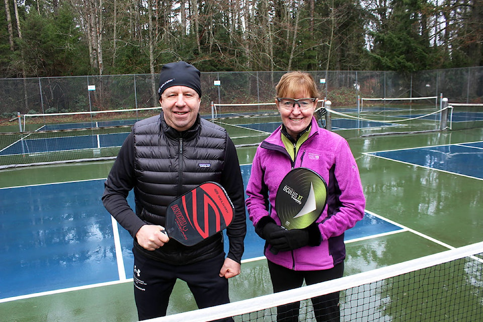 24145616_web1_210204-CHC-Snowbird-pickleball-players-rock_2