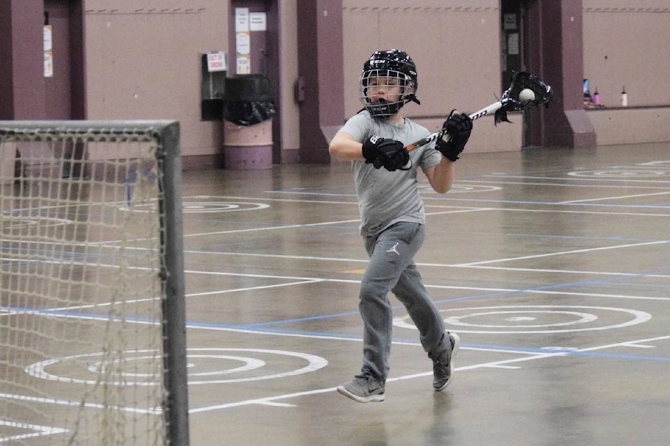 New lacrosse players practiced shooting drills during a “Try It” session at the Glenwood Centre on Thursday, March 18. (ELENA RARDON / ALBERNI VALLEY NEWS)