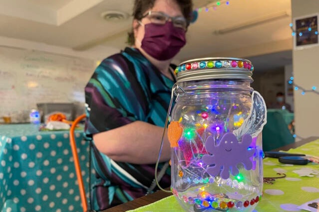 Lighting the way Jeanette Carnell finishes her lantern at the New Horizons Clubhouse prior to participating in the Canadian Mental Health Association’s walk for World Suicide Prevention Day Sept. 10, 2021. (SUSAN QUINN/ Alberni Valley News)