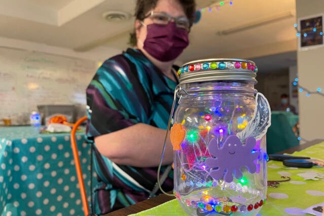 Lighting the way Jeanette Carnell finishes her lantern at the New Horizons Clubhouse prior to participating in the Canadian Mental Health Association’s walk for World Suicide Prevention Day Sept. 10, 2021. (SUSAN QUINN/ Alberni Valley News)