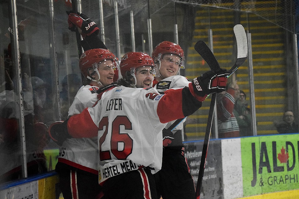 The Alberni Valley Bulldogs celebrate Brandon Buhr’s goal in the first period of Game 2 of the BCHL’s Coastal Conference quarter-final playoff series with Cowichan Capitals. (ELENA RARDON / ALBERNI VALLEY NEWS)