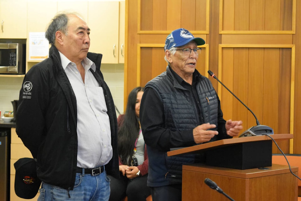 Huu-ay-aht First Nations Elected Chief Councillor Robert Dennis Sr. speaks to the ACRD board on April 13, 2022, accompanied by ha’wiih (hereditary chief) Jeff Cook. (ELENA RARDON / ALBERNI VALLEY NEWS)