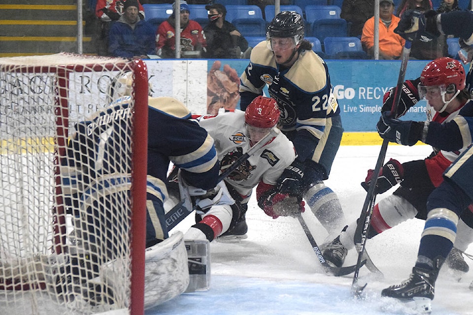 Alberni Valley Bulldogs forward Ethan Bono is pushed into the Langley net during Game 2 of the BCHL’s Coastal Conference semi-finals on April 16, 2022. (ELENA RARDON / ALBERNI VALLEY NEWS)