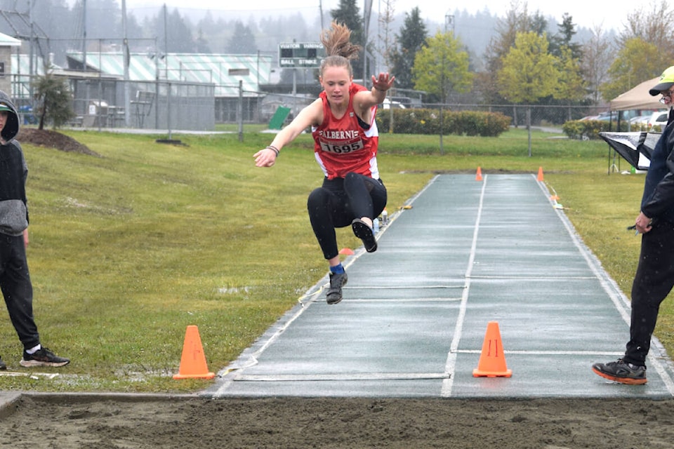 Eirin Skotheim of Alberni District Secondary School catches some air in the long jump during the North Island Championships at Bob Dailey Stadium on Thursday, May 5. (ELENA RARDON / ALBERNI VALLEY NEWS)