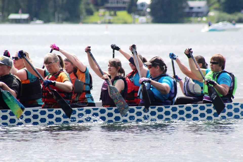 The Sproat Ness Dragons take to the water during one of their three timed races, June 12, 2022 at Sproat Lake Provincial Park. (SONJA DRINKWATER/ Special to the AV News)