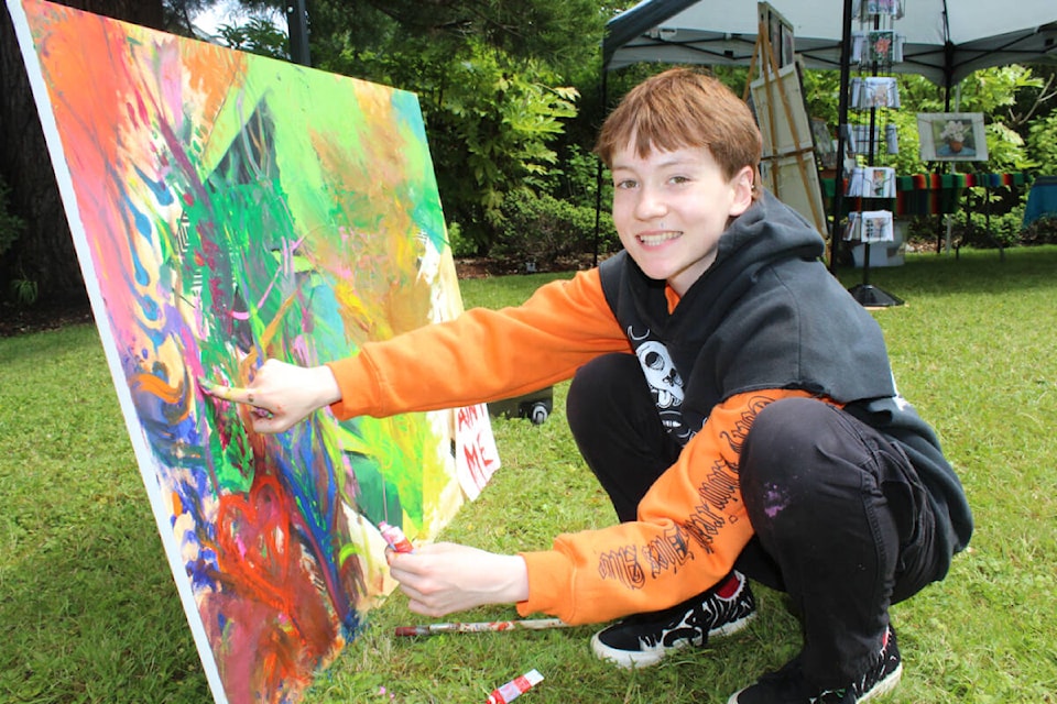 Daniel Gojda says he has loved painting ever since he was young. (SONJA DRINKWATER / ALBERNI VALLEY NEWS)