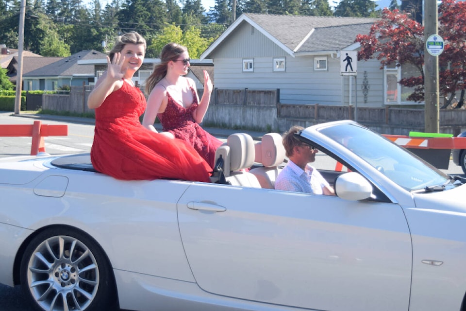 RIDING IN STYLE Alberni District Secondary School graduates cruise down 10th Avenue on Saturday, June 25 for their prom parade. Keep an eye out next week for more grad photos in our 2022 graduation supplement, July 6. (ELENA RARDON / ALBERNI VALLEY NEWS)