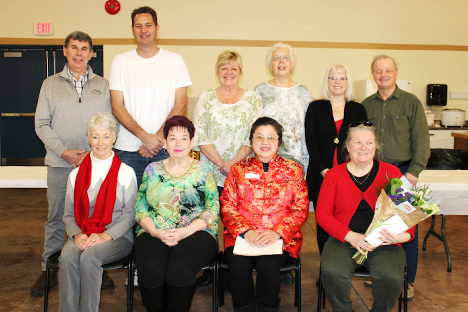 Donation recipients and presenters from the Chinese Canadian Society are standing from left to right: Larry Spencer, Greg Surry, Teresa Ludvigson, Betty Chan, Carol Brown and Scott Green. Seated from left to right are Robyn Monrufet, Judy Surry, Grace Tsai and Janice Konkin. (SONJA DRINKWATER/ Special to the AV News)