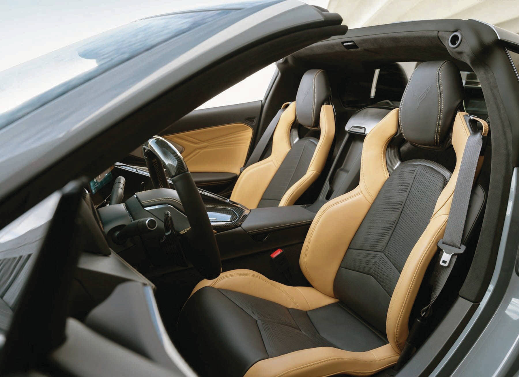 The Corvettes cockpit, although roomy enough, is much narrower than the width of the vehicle implies. Although the base E-Ray rings it at about $128,800, buyers can expect to pay much more for higher trim levels. PHOTO: CHEVROLET