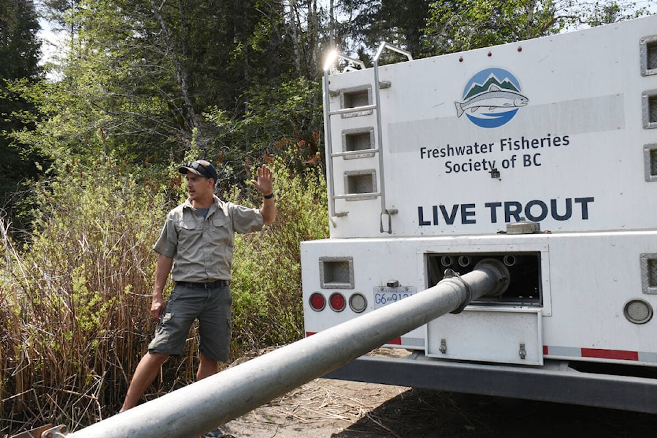 Fish culturist Graham Nessman prepares to release 250 rainbow trout from a special tank truck into Loon Lake on May 18, 2023. (SUSAN QUINN/ Alberni Valley News)