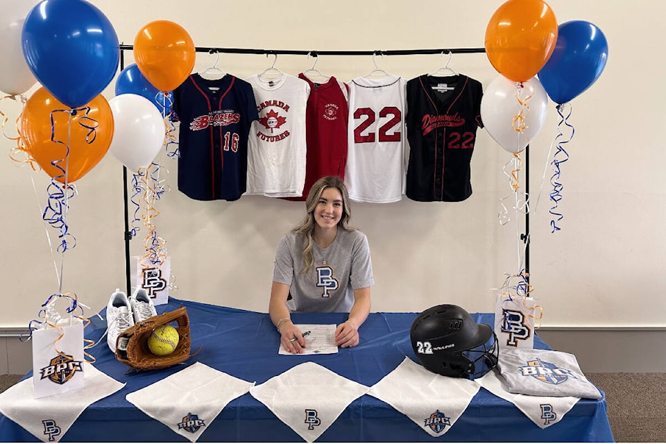 Hannah Rust signs a commitment to play softball with Brewton-Parker College in Mount Vernon, Georgia, starting in the fall of 2023. (PHOTO COURTESY HANNAH RUST)