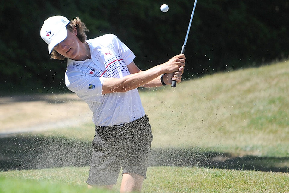 Parksville’s Gavyn Knight hits out of the sand trap at 2023 B.C. Amateur Men’s Golf Championship Morningstar Golf Course on Friday, July 14. (Michael Briones photo)