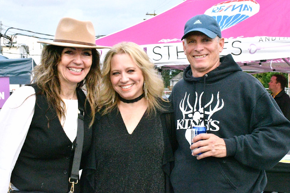 Alyssa Nielsen (center) performed at the second annual Groove & Grub event, organized by Jodi Steeves (left) on Aug. 24. (Kyler Emerson/Aldergrove Star)