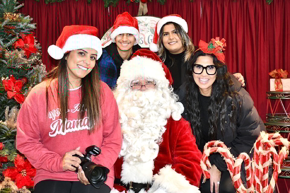 Murrayville's Saran family held their annual Santa photos fundraiser at Alpine Tree Farm in Aldergrove on Nov. 30. (Kyler Emerson/Aldergrove Star)