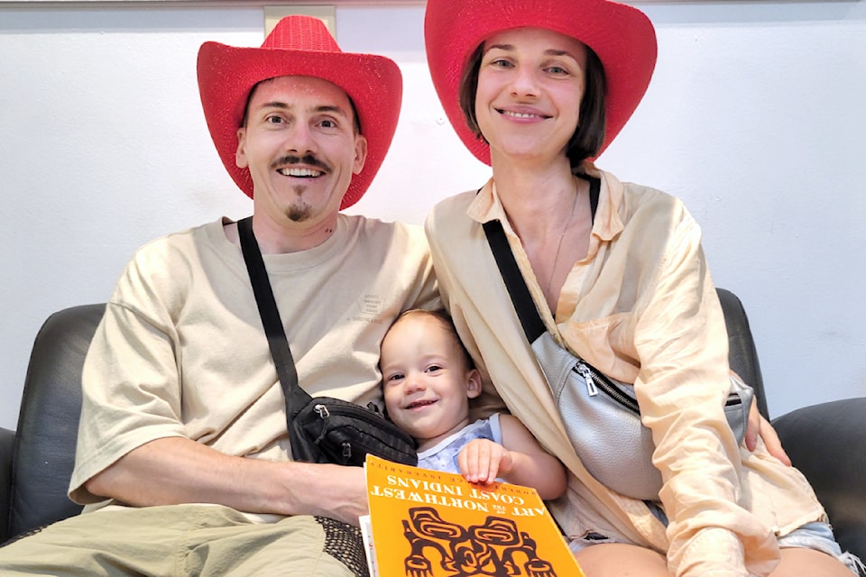 Family of three Artem Ponomarov, Maria Yanchuk, and their little boy Michael volunteered for the first time at the Aldergrove Fair since moving to 91ԭ City in 2022 from Ukraine. 