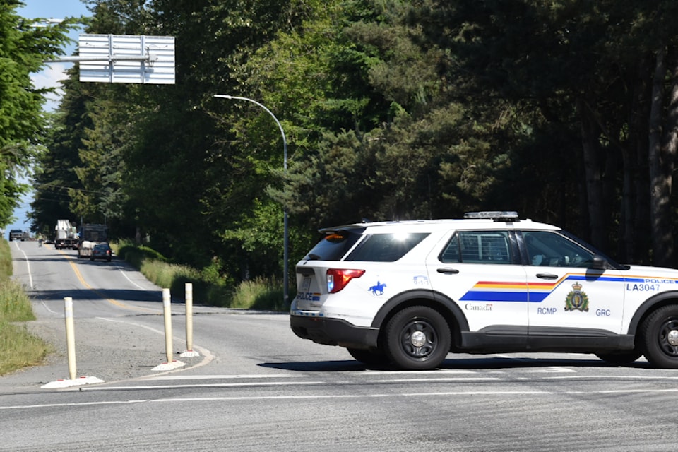 Mounties closed 16 Avenue between 272 Street and Lefeuvre Road due to a crash involving a motorcyclist Thursday afternoon, June 20. (Curtis Kreklau/Special to The Star)