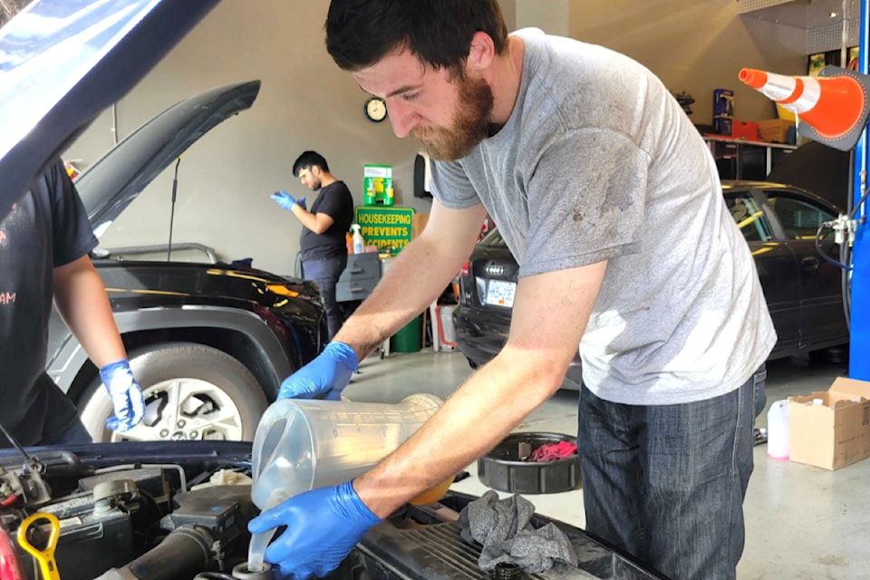 Volunteers gave free oil changes to more than 50 vehicles of single moms at Church in the Valley on Sunday, June 9. 