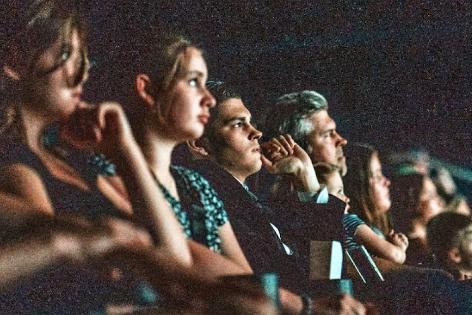 Max Martin (center), 17, watched his film premier at the Langley Cineplex theatre in August. (Special to The Star)