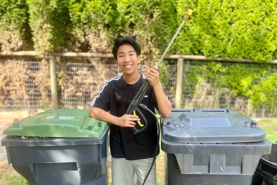 Teens with garbage bins