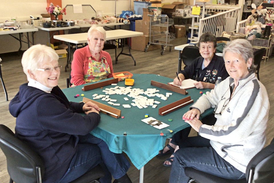 Aldergrove Veterans & Seniors Society members, including Rea Coates (centre left), playing Mexican train dominoes. (Special to The Star)