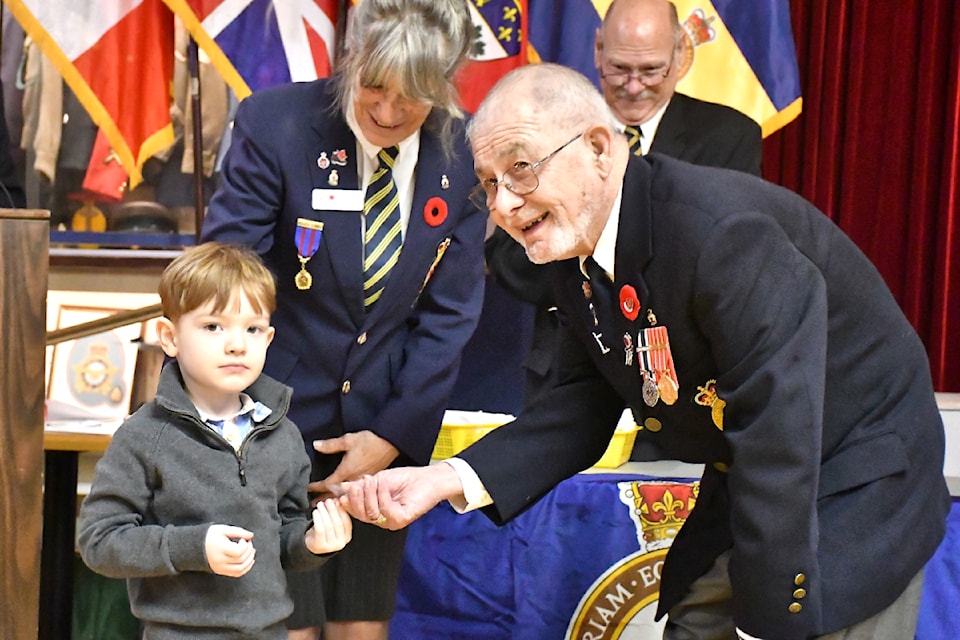 Metis Elder Ken Pruden was presented his 30-year pin by his great grandson Hayden Larkin at the Aldergrove legion on Sunday, Jan. 19. (Kyler Emerson/Aldergrove Star)