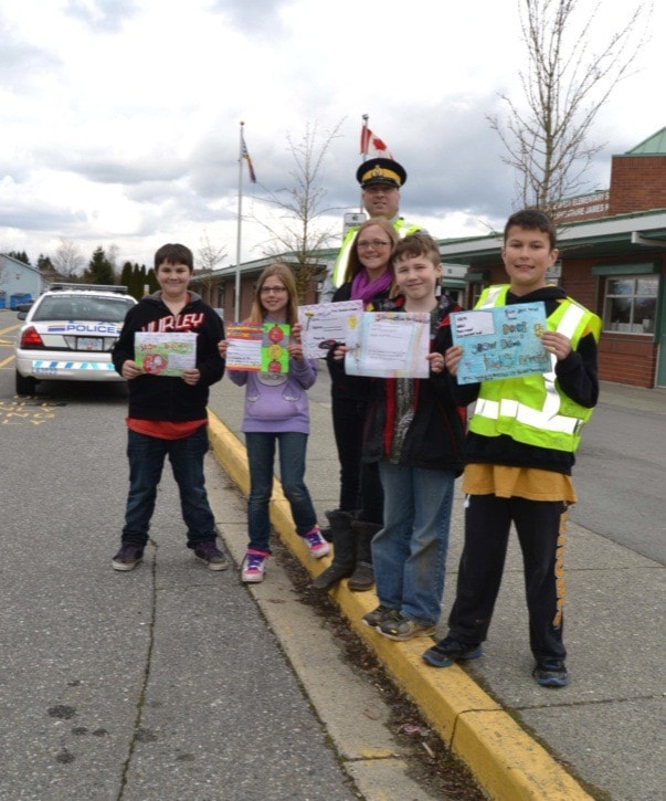 James Kennedy students hand out speed tickets