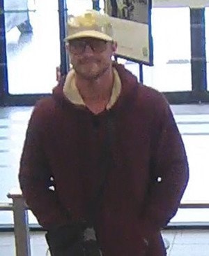 Suspect in a robbery at a bank in the 32400 block of South Fraser Way on May 5.