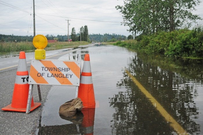 Miranda GATHERCOLE 2012-06-22
Flooding on River Road at 264 Street.