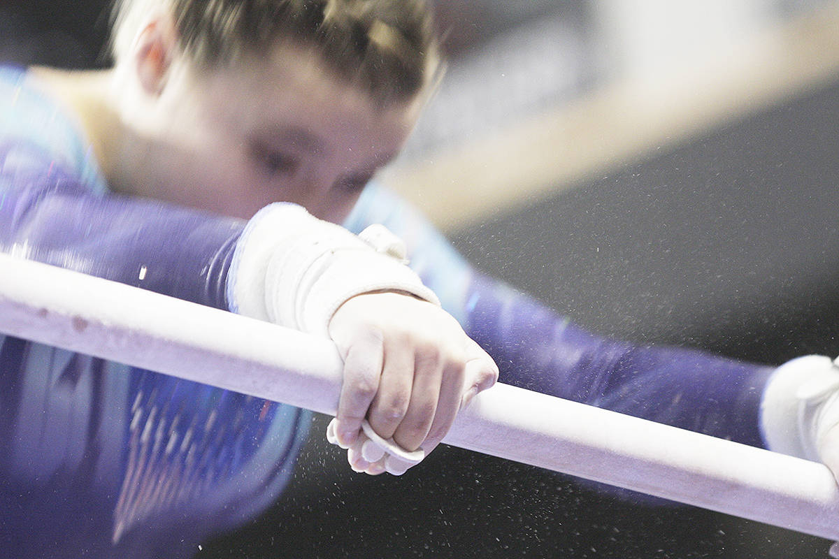 9637363_web1_171202-LAT-Langley-Gymnastics-tournament-competitor