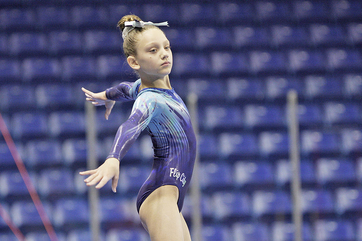 9637363_web1_171202-LAT-Langley-Gymnastics-tournament-competitor2