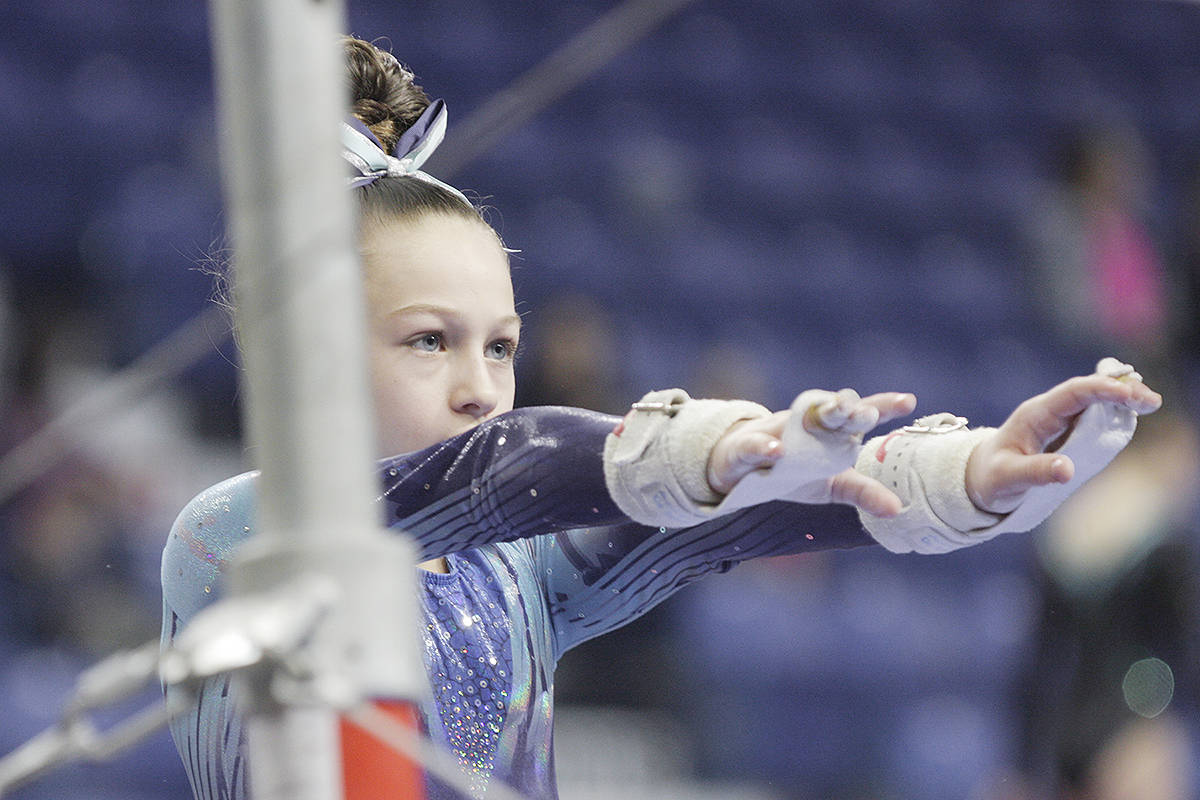 9637363_web1_171202-LAT-Langley-Gymnastics-tournament-competitor3