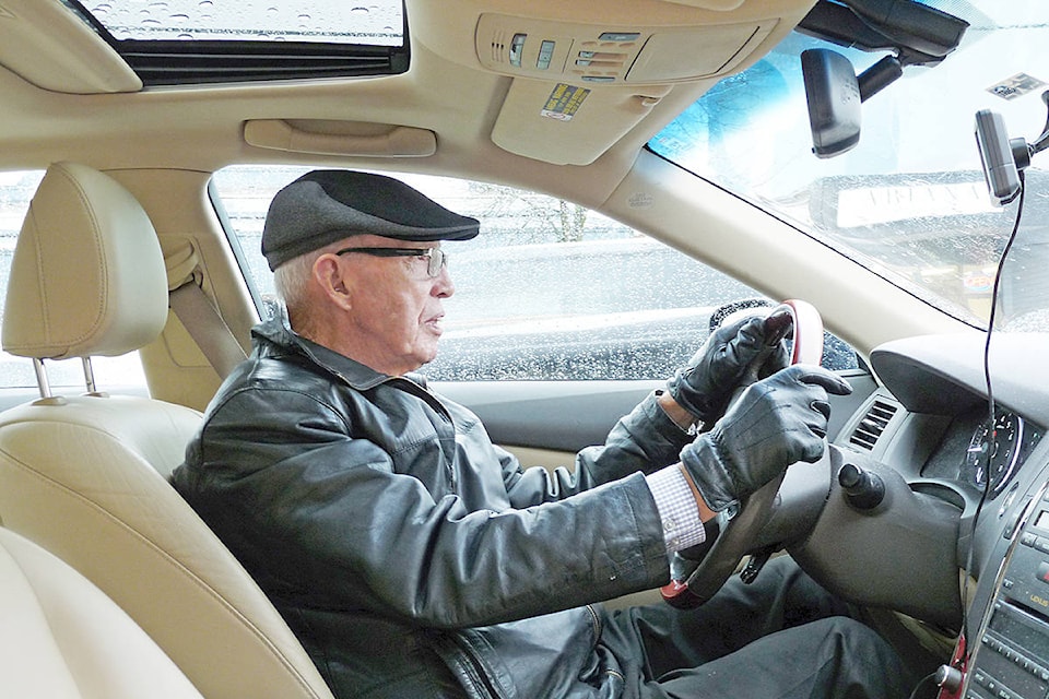 10489778_web1_180129-LAT-George-Garrett-at-wheel