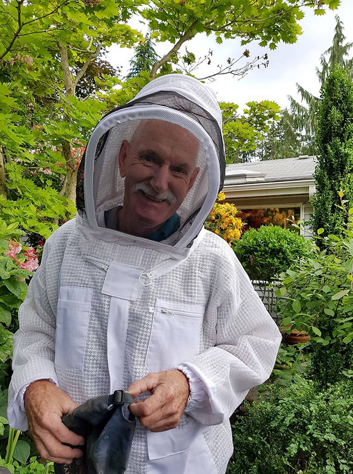 12266136_web1_Tom-the-beekeeperC