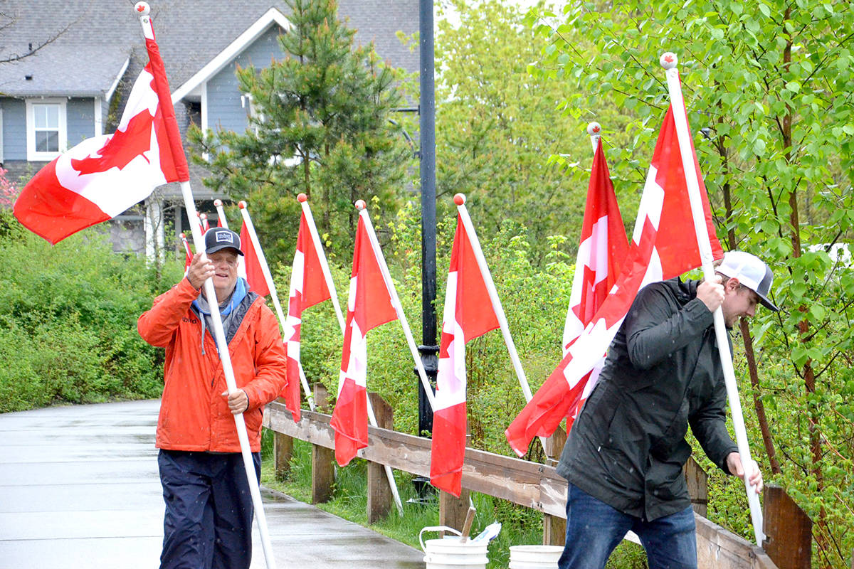 21369932_web1_200425-LAT-Flag-Raising-flag_3