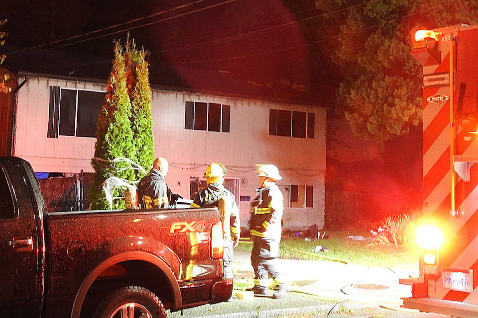 Crews were trying to clear a Langley City house of smoke, after a fire was reported during the dinner hour Tuesday on 52nd Avenue, just west of 203rd Street. (Lisa Farquharson/Langley Advance Times)