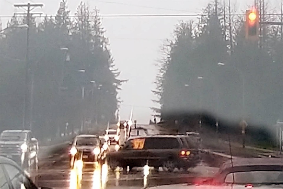 A dashcam caught the moment when a burning van went through the intersection of 88 Avenue and 216 Street in Langley’s Walnut Grove neighbourhood on Tuesday, Nov. 17, 2020 around 2:30 p.m. (special to Langley Advance Times)