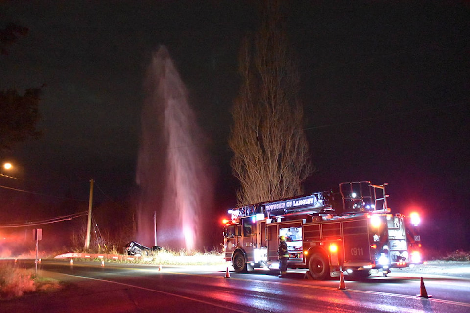 Township of Langley firefighters were called to a crash Thursday, Dec. 3, 2020 where the lone driver of a pickup truck damaged a water main leaving Trinity Western University without water. (Curtis Kreklau/Special to Langley Advance Times)