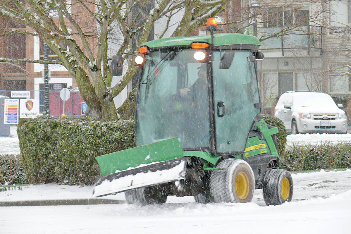 24226299_web1_210213-LAT-snowfall-hits-Langley_6