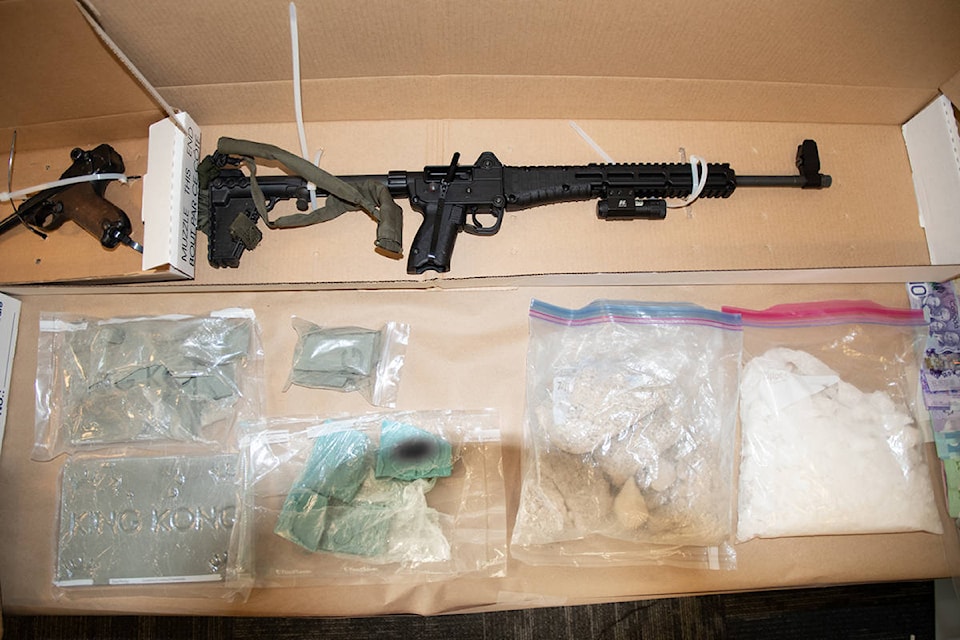 Firearms and narcotics were seized. (RCMP/Special to Black Press)