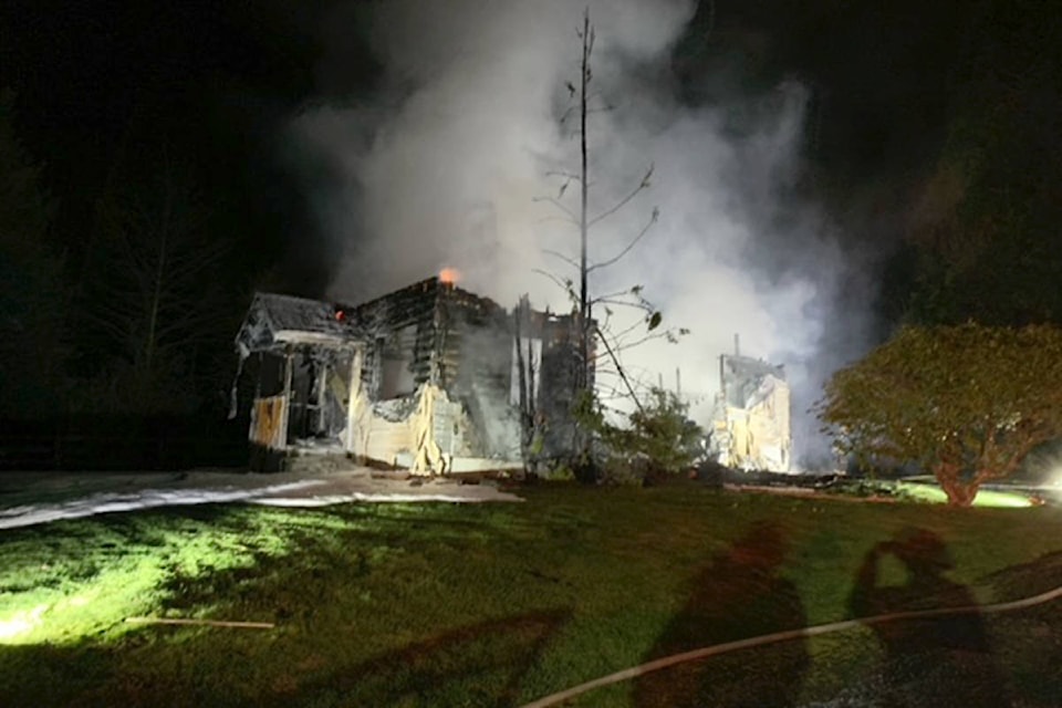 24726751_web1_210402-LAT-HouseFire-Langley_2