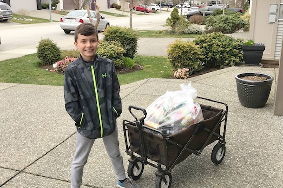 Nixon Mahovlic, 8, was inspired by kindness week at Fort Langley Elementary so he set out to collect bottles to raise money for a local family in need. (Steve Mahovlic/Special to Langley Advance Times)