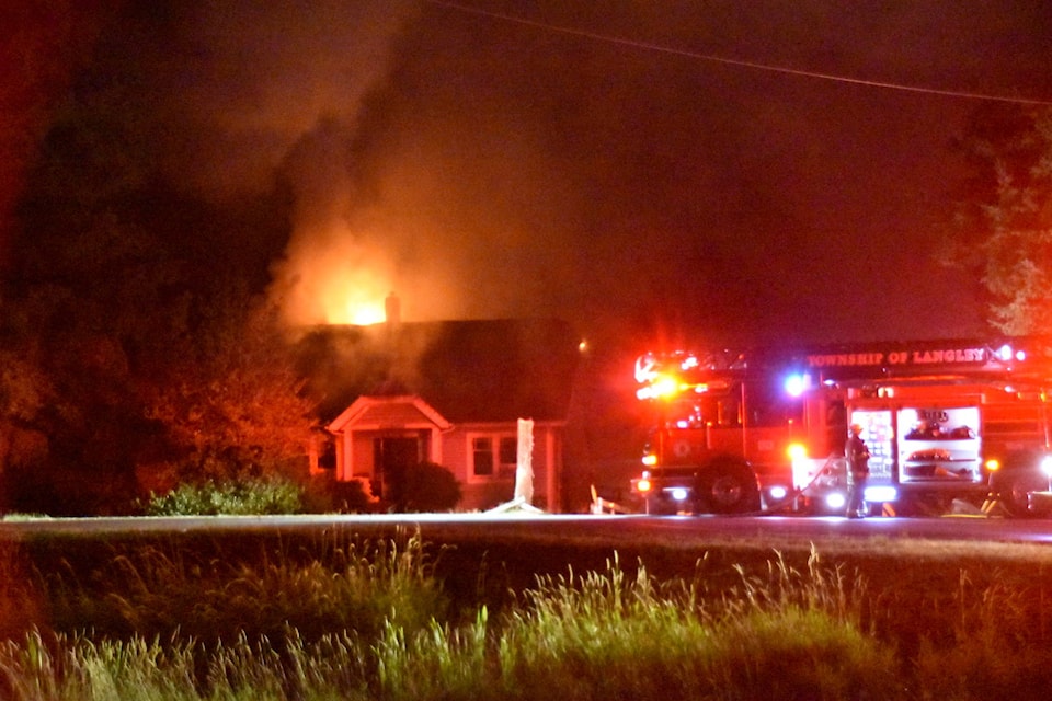 About 30 Township of Langley firefighters were called to battle a house fire on a mobile home property at 23390 72 Ave. around 10 p.m. Wednesday night, Aug. 25. 2021. (Curtis Kreklau/Special to Langley Advance Times)