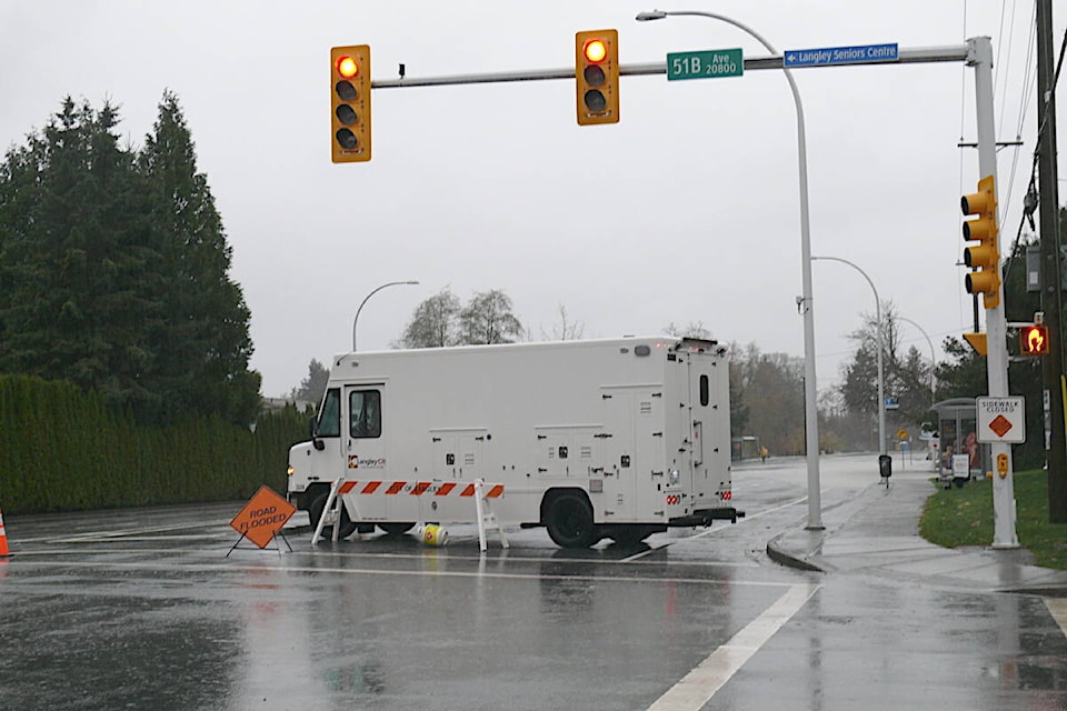 27206117_web1_211116-LAT-DF-storm-aftermath-roadblocked_1