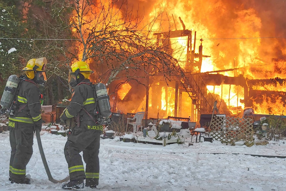 Township crews responded to a property in the 2100 block of 198th Street on Tuesday afternoon, Dec. 28, 2021 for a blaze. (Dan Ferguson/Langley Advance Times)