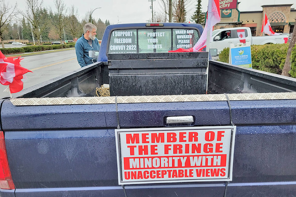 Participants in a pro-convoy drive from Langley on Saturday, Feb. 19 arrived to find it had been cancelled. Most said they would head to another protest at the border, instead. (Dan Ferguson/Langley Advance Times)