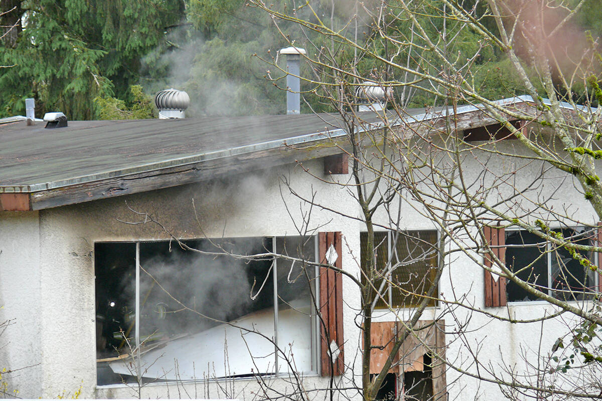 Langley Township Fire Department was called to a boarded up home at 206th Street and 71B Avenue Monday, March 21, 2022. (Dan Ferguson/Langley Advance Times)