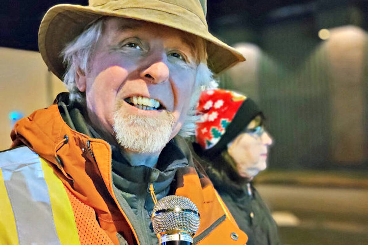 Aldergrove Fair president Robin McIntosh, seen here providing running commentary during the Aldergrove Light Up Christmas parade, revealed plans for a bigger and better fair in July. (Langley Advance Times file)