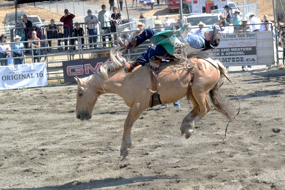 Thousands attended Langley’s first ever professional rodeo at Langley Riders Society’s rodeo ground. Some enjoyed from the stands while many cheered from the grass area surrounding the rodeo arena. Riders who currently top the Canadian Professional Rodeo Association’s (CPRA) standings are competing at the Valley West Stampede (VWS). (Tanmay Ahluwalia/Langley Advance Times)
