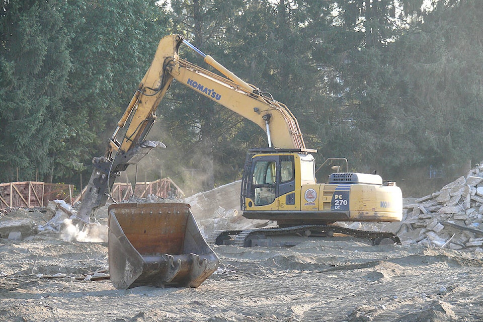 On Monday, Oct. 3, 2020, workers were using a jack hammer to break up concrete rubble as the demolition of the former shopping mall on 272nd Street near Fraser Highway entered its final stages. (Dan Ferguson/Langley Advance Times)